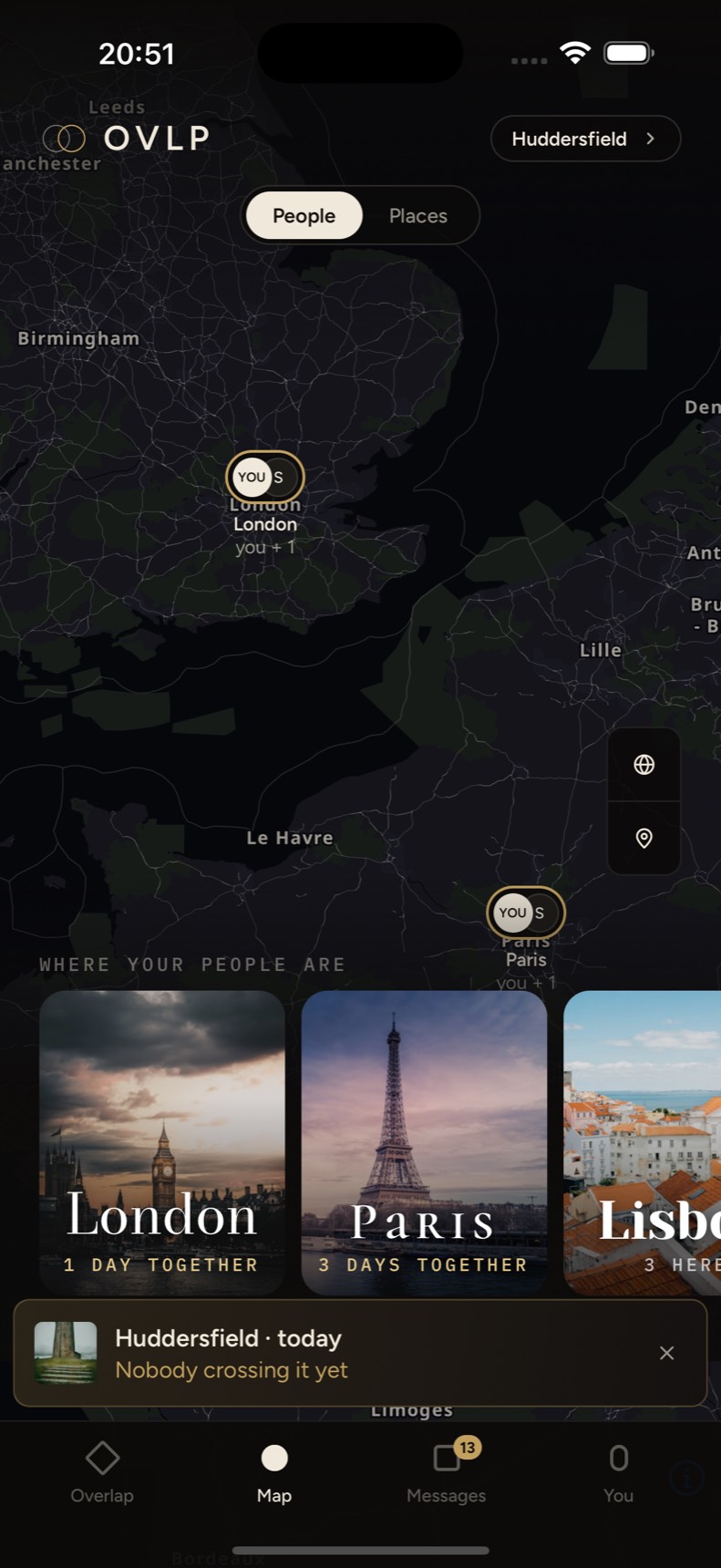The OVLP map on its People layer: badges over London and Paris, with the city cards along the bottom.